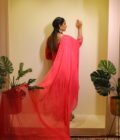 This vibrant ensemble is an amalgamation of varied hand embroidered crafts like resham and pearl work along with zardozi dabka work on the shirt (kurta). With its light, chinon dupatta the sharara and shirt set becomes perfect for special occasions, weddings, or festivals.