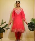 This vibrant ensemble is an amalgamation of varied hand embroidered crafts like resham and pearl work along with zardozi dabka work on the shirt (kurta). With its light, chinon dupatta the sharara and shirt set becomes perfect for special occasions, weddings, or festivals.